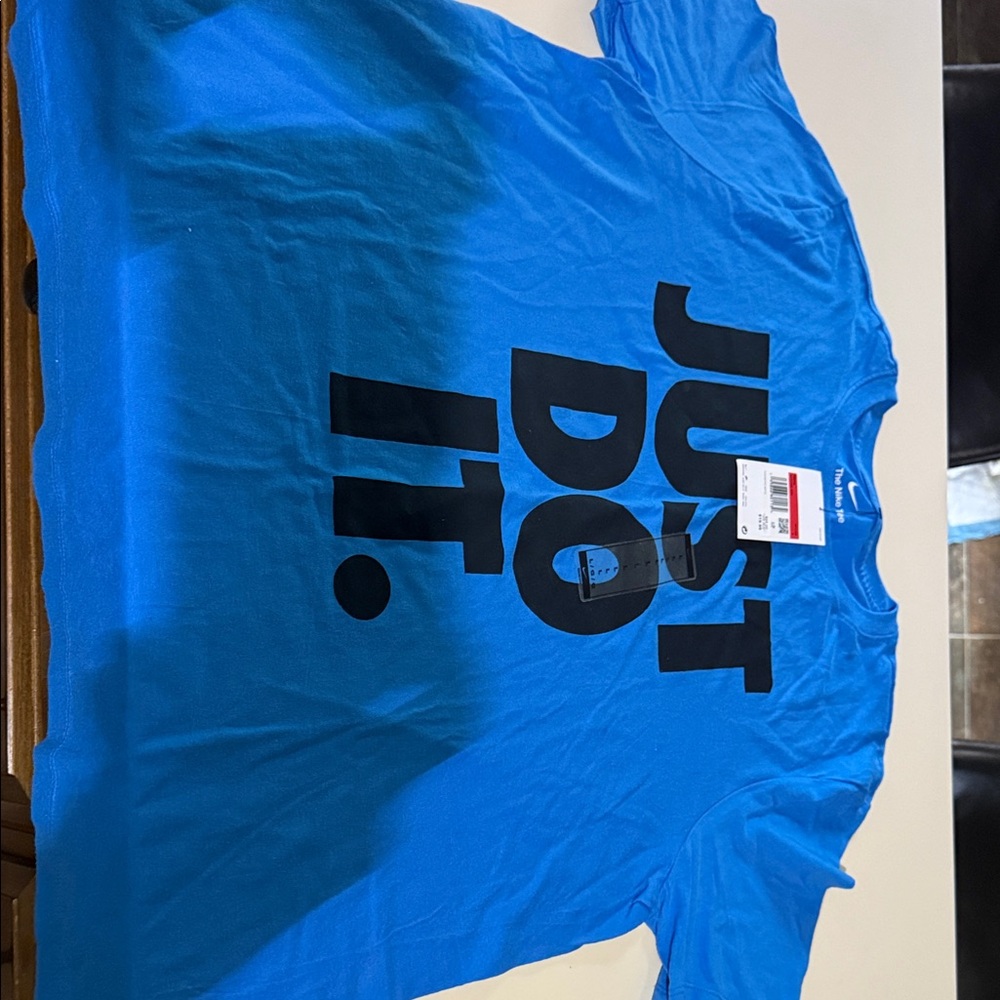 Nike Vibrant Blue Tee with Bold Black Slogan